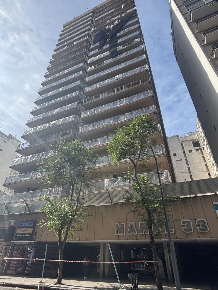 Ambiente al lateral, reciclado y equipado, zona Centro