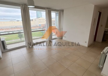 Alquiler 24 meses departamento 2 ambientes con cochera y balcon zona Puerto 